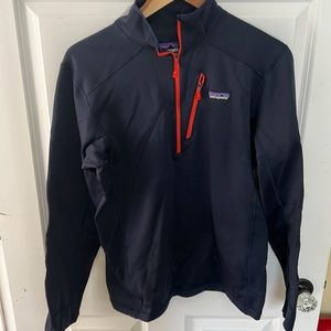 Patagonia quarter zip navy with orange zipper